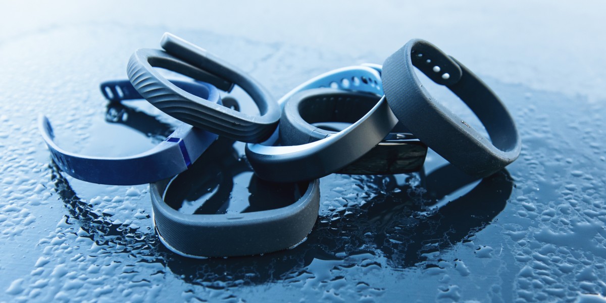 Wearable activity trackers for fitness placed in a pile